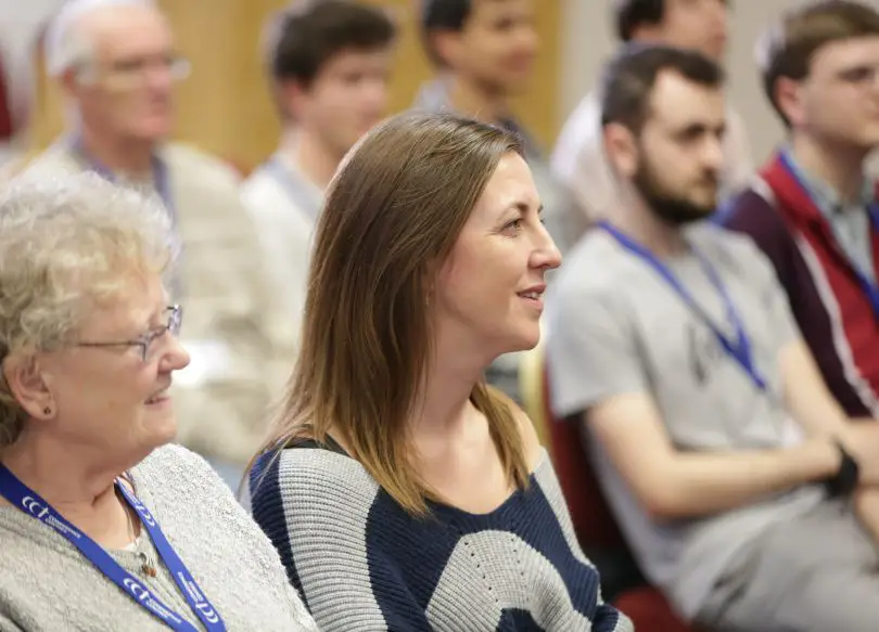 Group members in a church family meeting