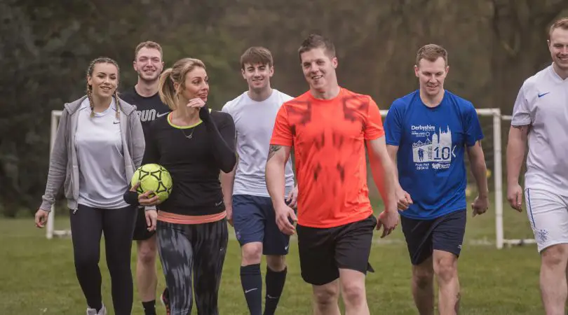 Group of youths playing football