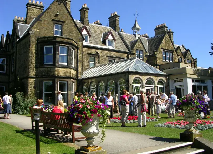 A group of people at The Hayes, enjoying the sunshine in the garden