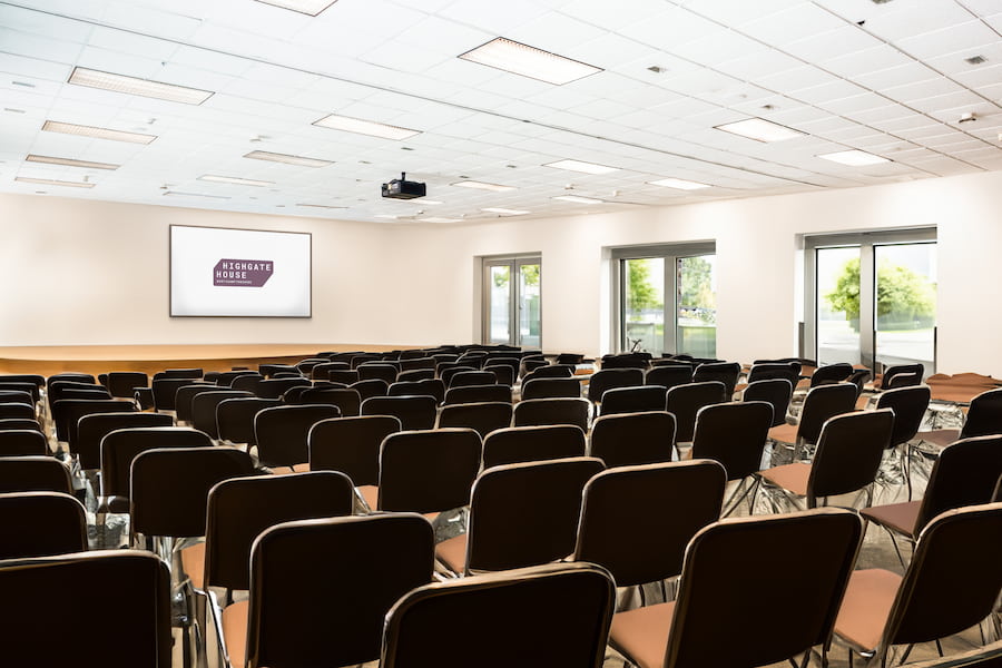 A meeting hall called Aspen which can seat 200 delegates, with 3 glass double doors on the right-hand wall and a large projector screen at the front wall.