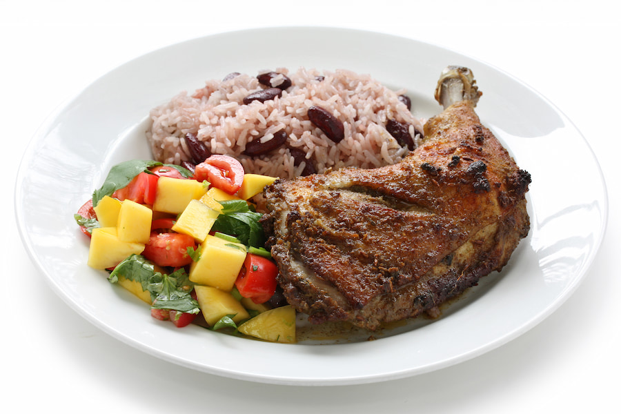 Caribbean Jerk Chicken with some bean rice and a colourful salad.