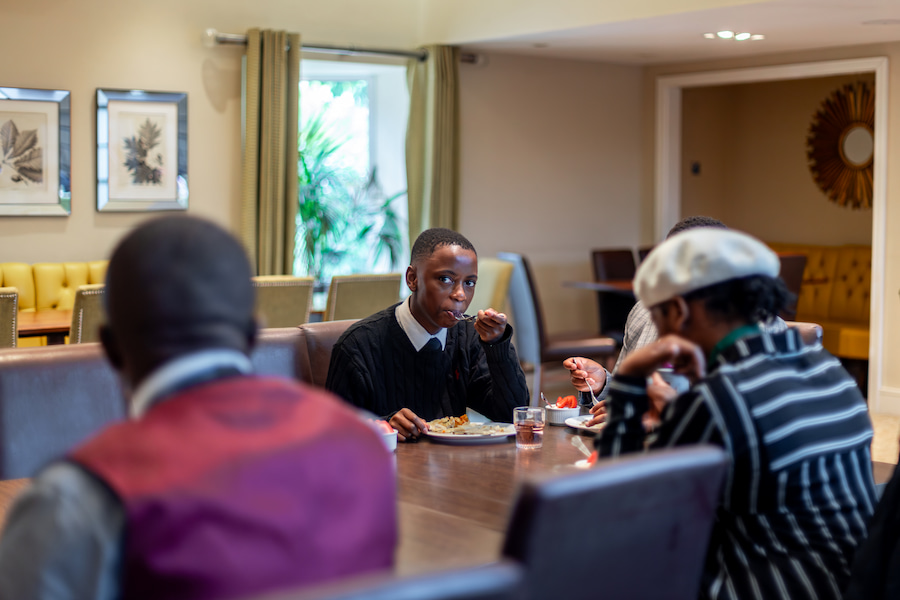 A group from a black-majority church eating together.