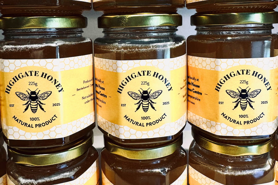 Highgate Honey jars stacked up.
